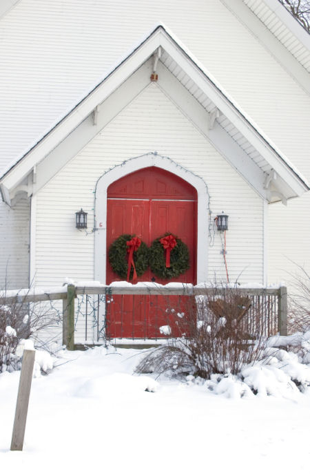 Red Church Door with Christmas wreaths Red Church Door with Christmas wreaths